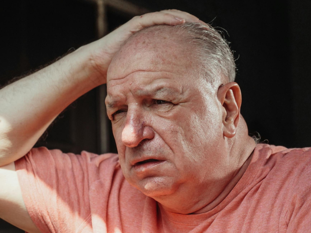 A close-up of a distressed witness reflecting on their experience. — emotional impact on witnesses Pennsylvania