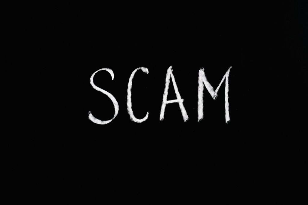 A flowchart on steps to report a suspected charity scam, highlighting types of charity scams