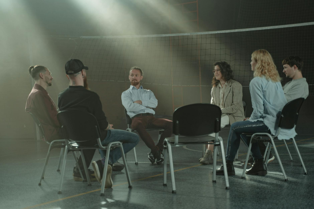 A group therapy session illustrating the support network for witnesses, highlighting the emotional impact on witnesses Pennsylvania.