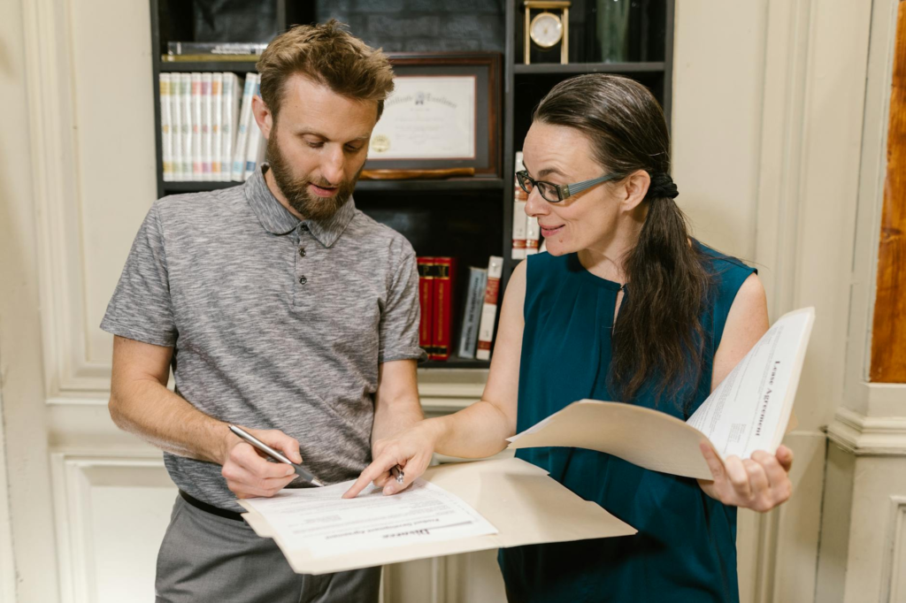A photo of a legal professional advising a client about court appearances related to the consequences of not testifying Pennsylvania.