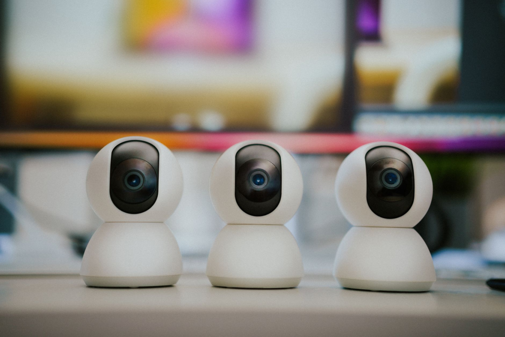 A family installing a home security system in their living room. — crime prevention tips