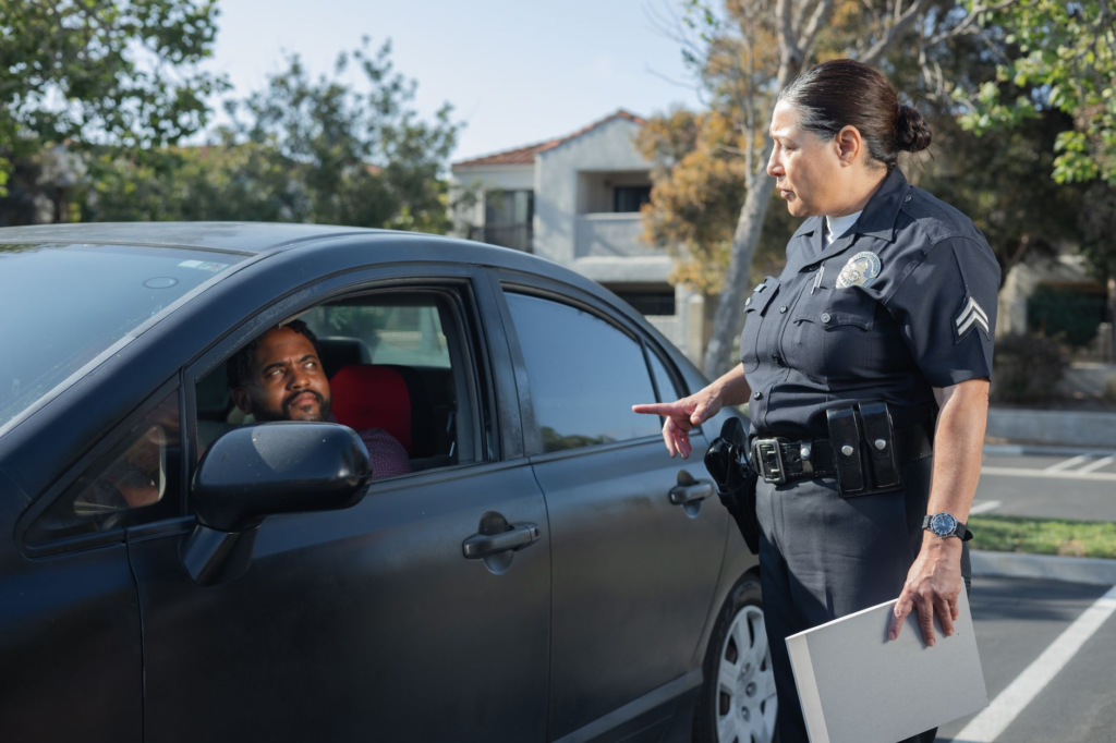 A police officer receiving a tip from a community member — PA Crime Stoppers success stories