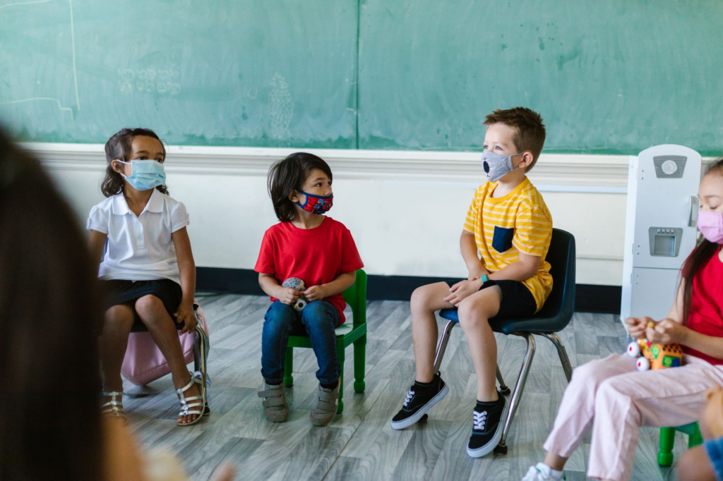 Children learning about safety and crime prevention in a workshop. — community crime prevention
