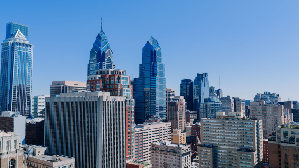 Image of Pennsylvania Crime Stoppers logo with a backdrop of a cityscape