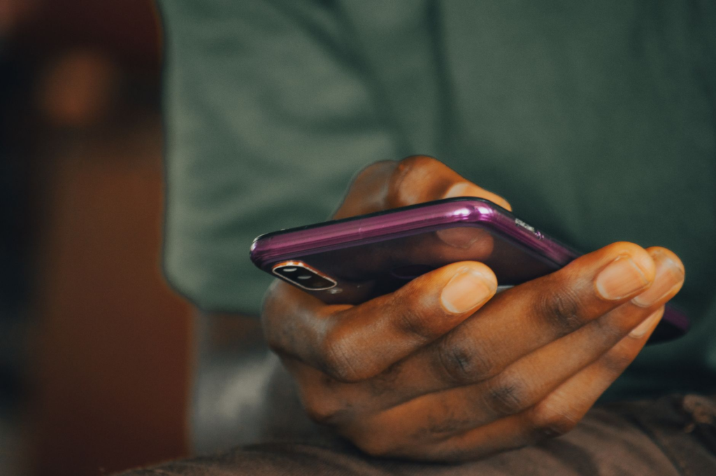 Image of a person using their phone to submit a crime tip text message. — submit tip Pennsylvania Crime Stoppers