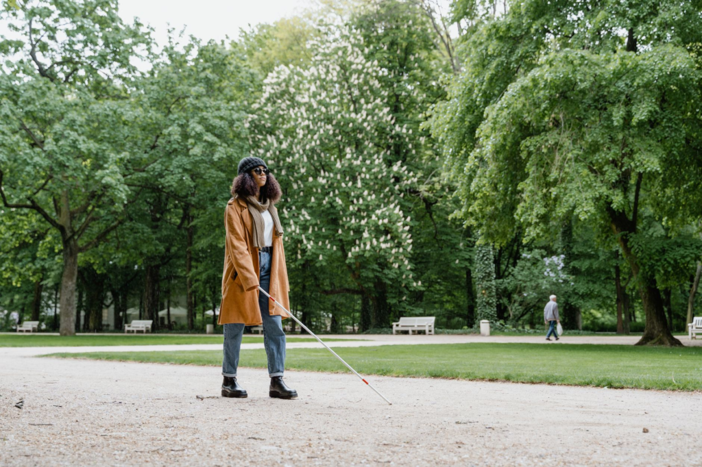 A person walking in a park, looking alert and aware of their surroundings. — safety tips Pennsylvania