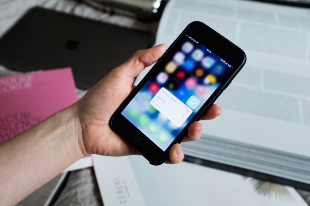 A photo showing a person using a mobile app to report a crime tip. — submit tip to PA Crime Stoppers