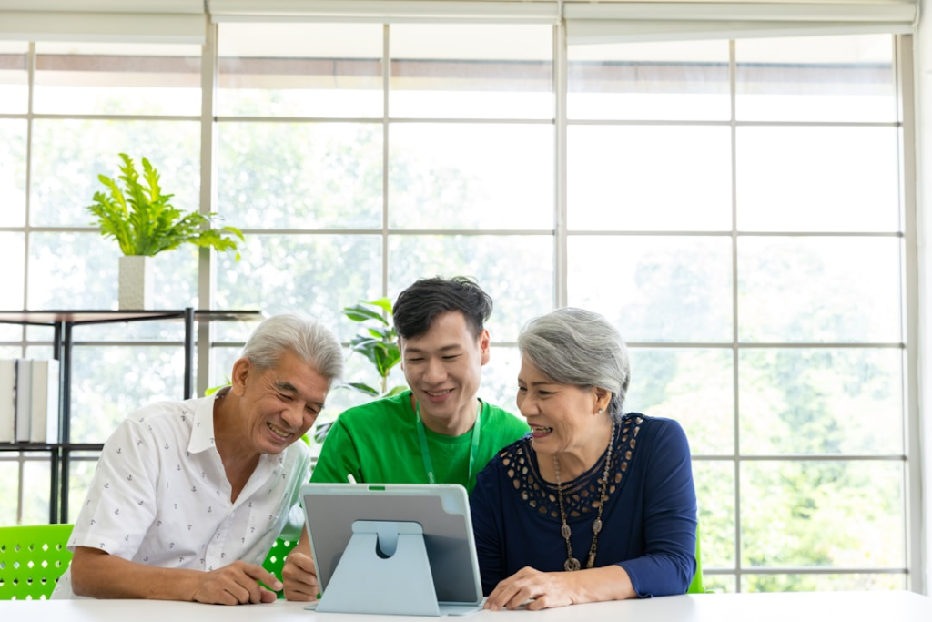 An illustration of a family discussing how to protect elderly relatives from scams. — senior scam prevention