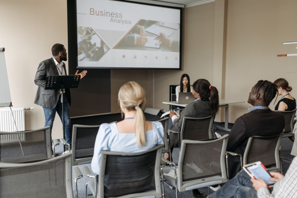 Illustration of a small business team participating in a fraud prevention training workshop. — small business crime prev…