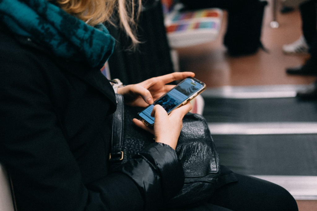 Image of a person using a smartphone to report a crime anonymously — report a crime anonymously Pennsylvania