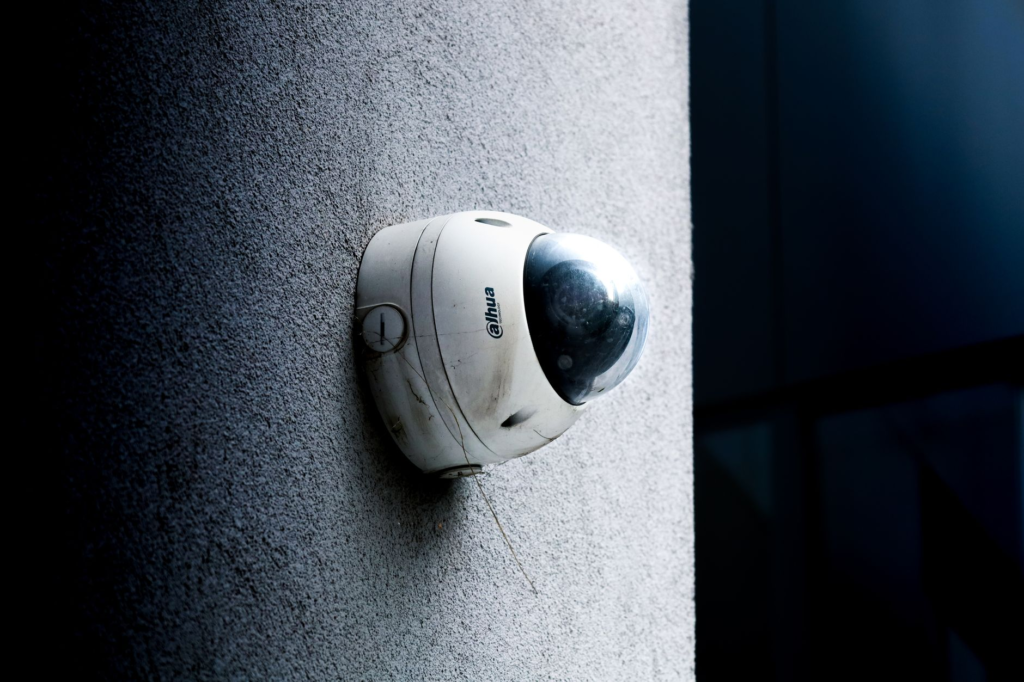 Image of a security camera installed in a retail store, showcasing effective small business crime prevention.