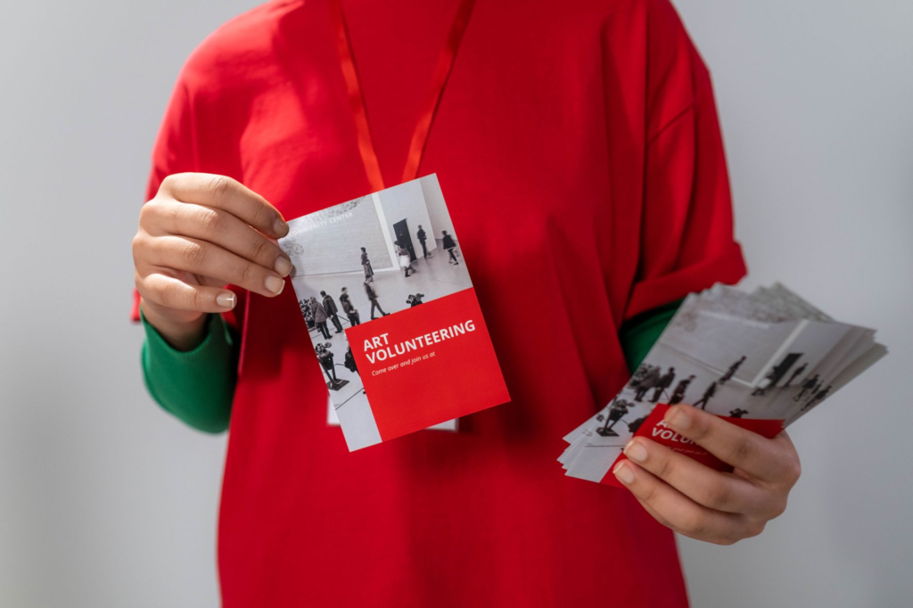 Photo of volunteers preparing for an upcoming event with banners and promotional materials. — PA Crime Stoppers events 2026