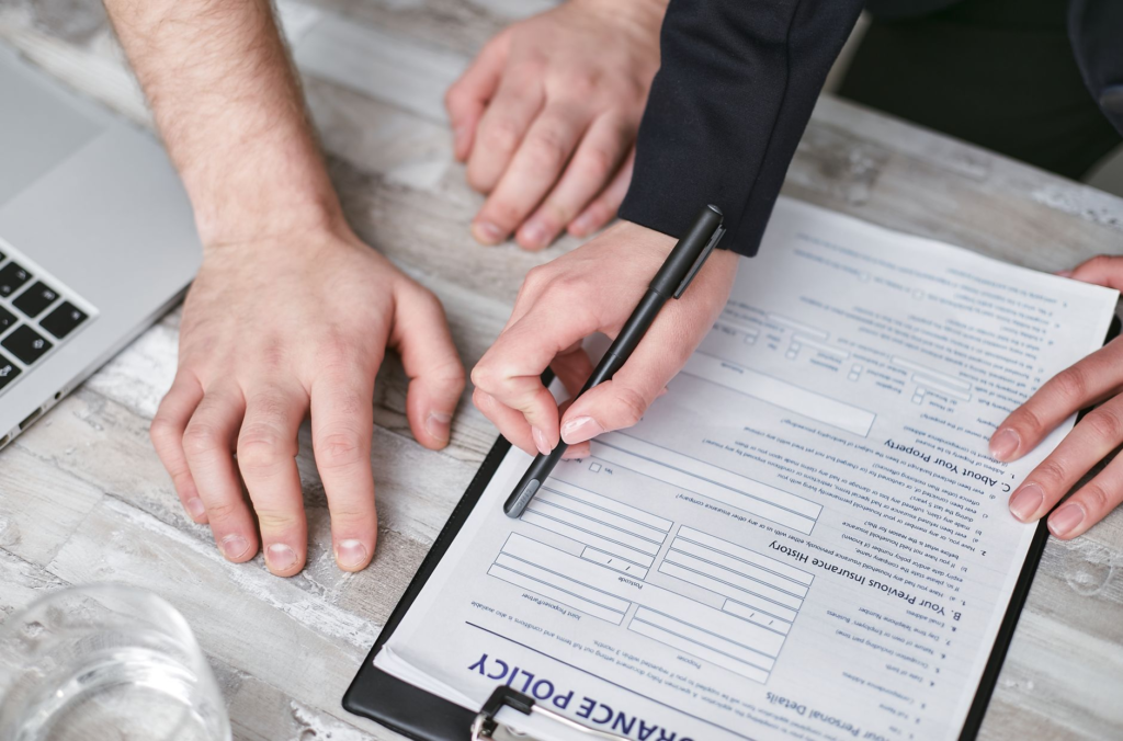 Visual of a comprehensive security policy document being reviewed by business owners. — small business crime prevention