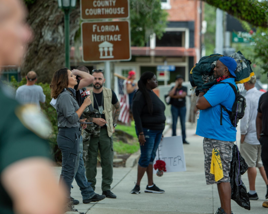 A community event where citizens engage with Crime Stoppers representatives. — myths about PA Crime Stoppers