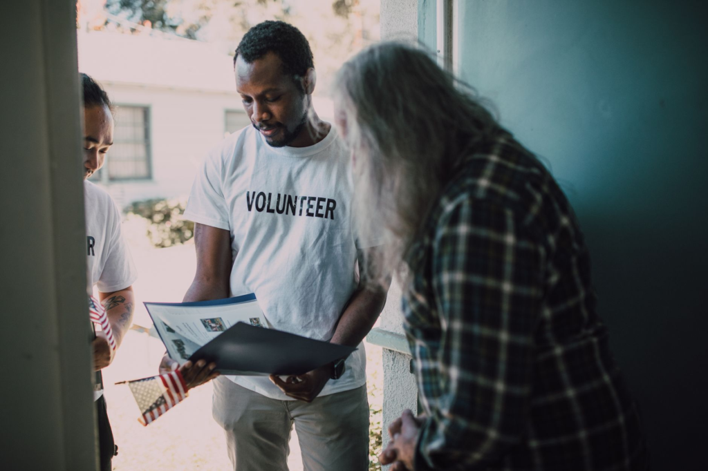 A group of volunteers from PA Crime Stoppers engaging with local residents. — role of PA Crime Stoppers