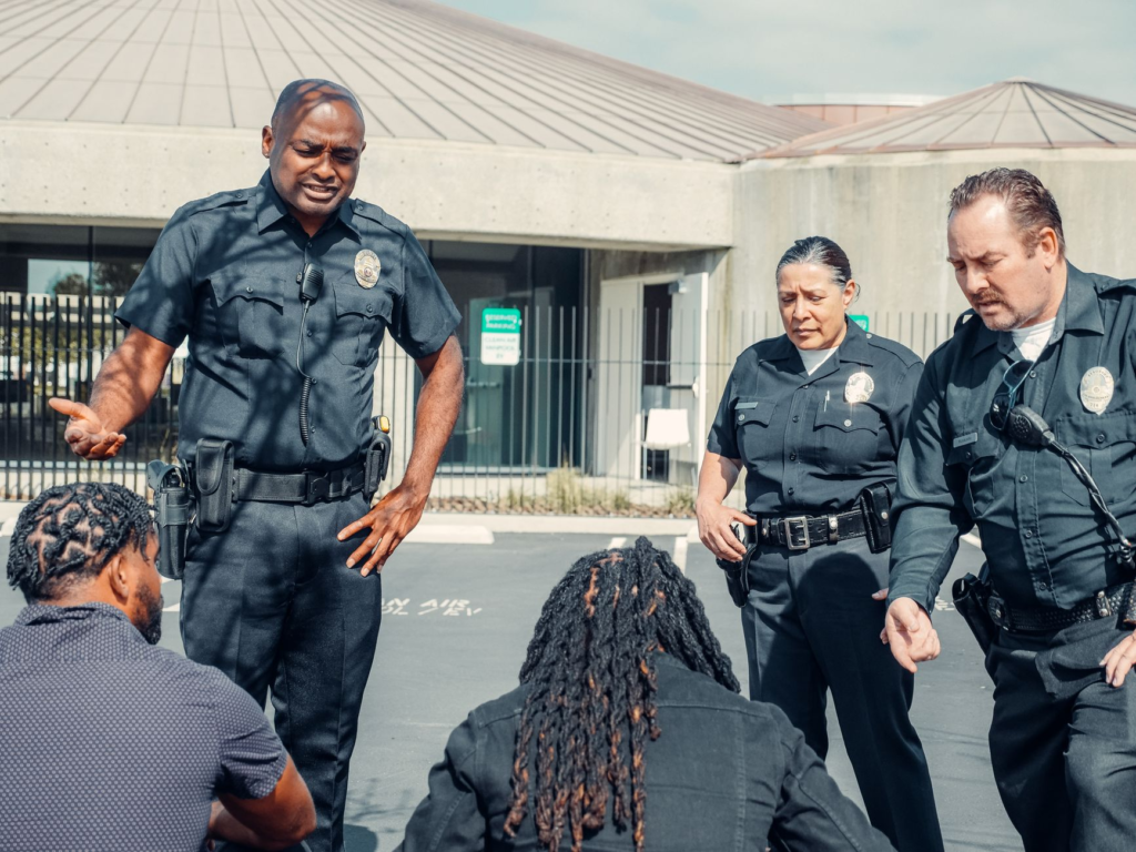 An image of a community meeting discussing crime prevention, highlighting the importance of how to submit a tip to PA Crime Stoppers.