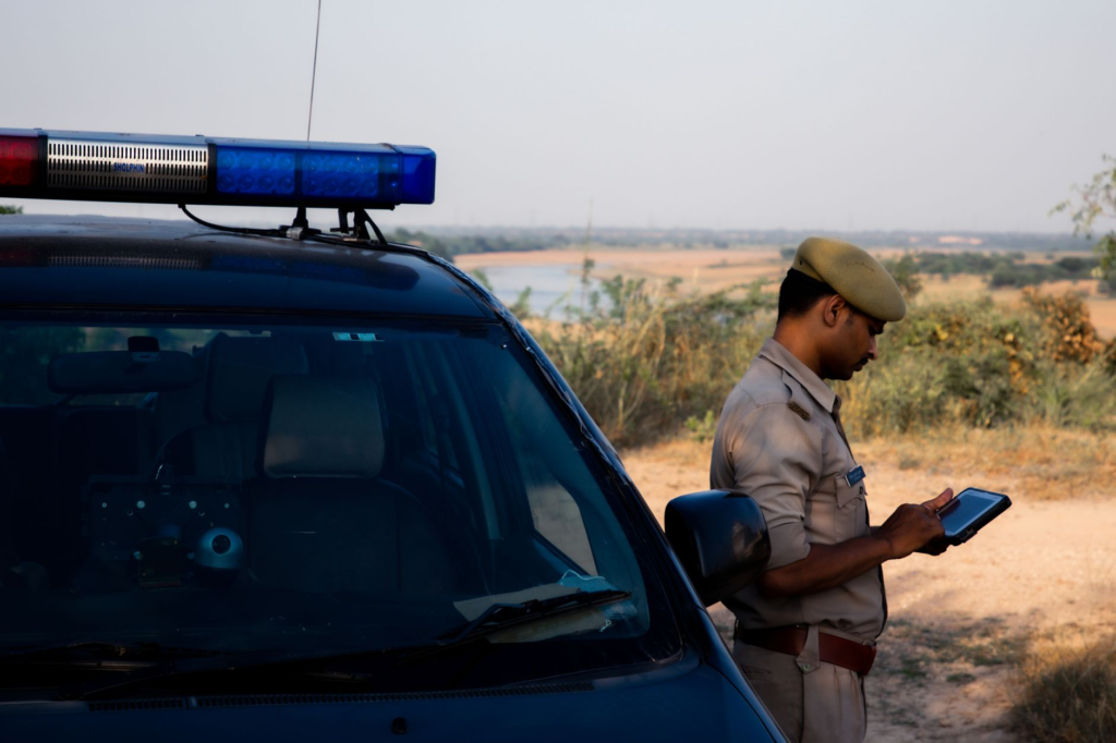 An image of law enforcement officers using technology in crime investigations. — PA Crime Stoppers technology adaptation