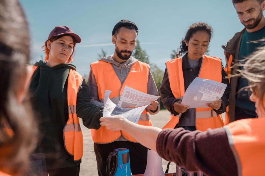 Group of volunteers working together on a community project to enhance public safety. — community involvement PA Crime S…