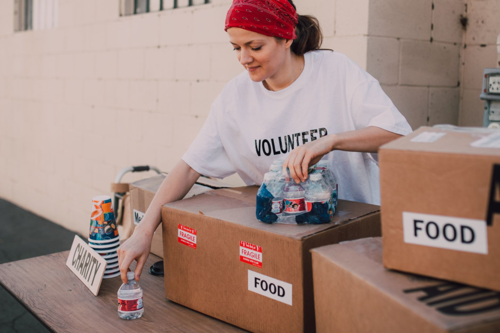 Image of a volunteer helping organize community outreach activities — volunteering with PA Crime Stoppers
