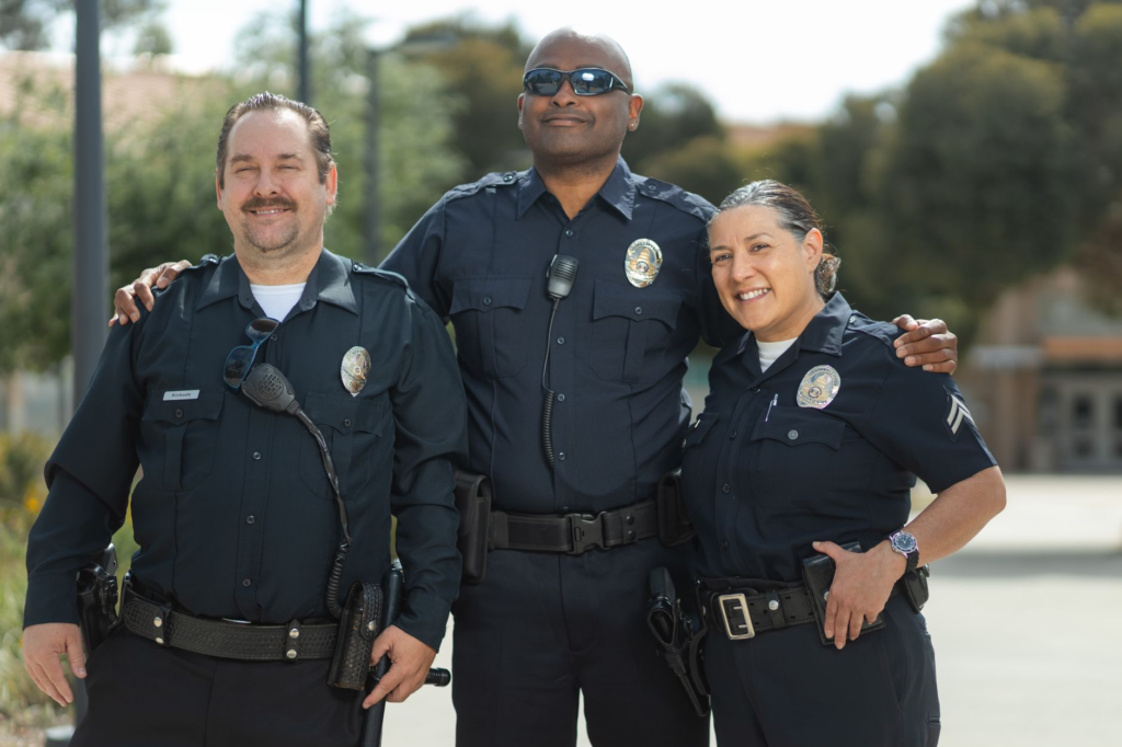 Photo of law enforcement officers working with the community. — submit tip PA Crime Stoppers
