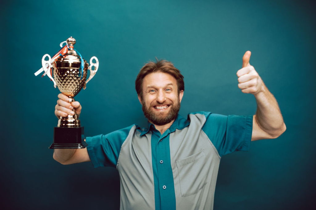 An image of a satisfied citizen receiving a reward from Crime Stoppers rewards
