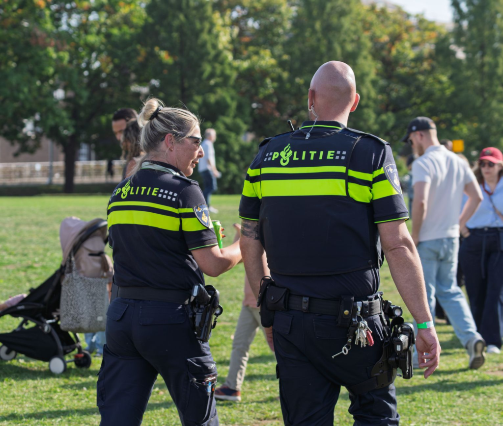 A Crime Stoppers event in a local park with families and law enforcement officers. — community role in PA Crime Stoppers